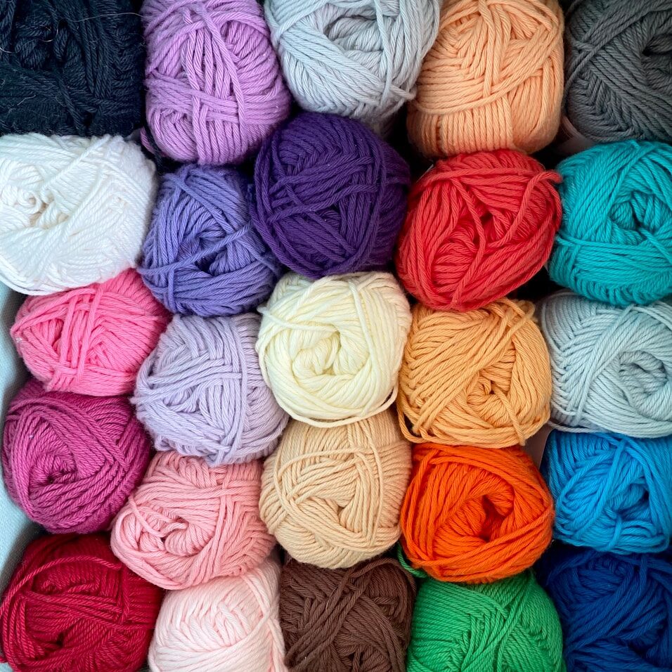 pink blue and yellow yarn